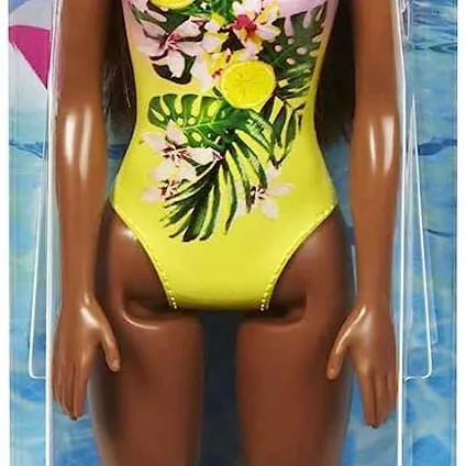 Barbie Doll Features Long Brunette Hair And Stylish Floral Swimsuit